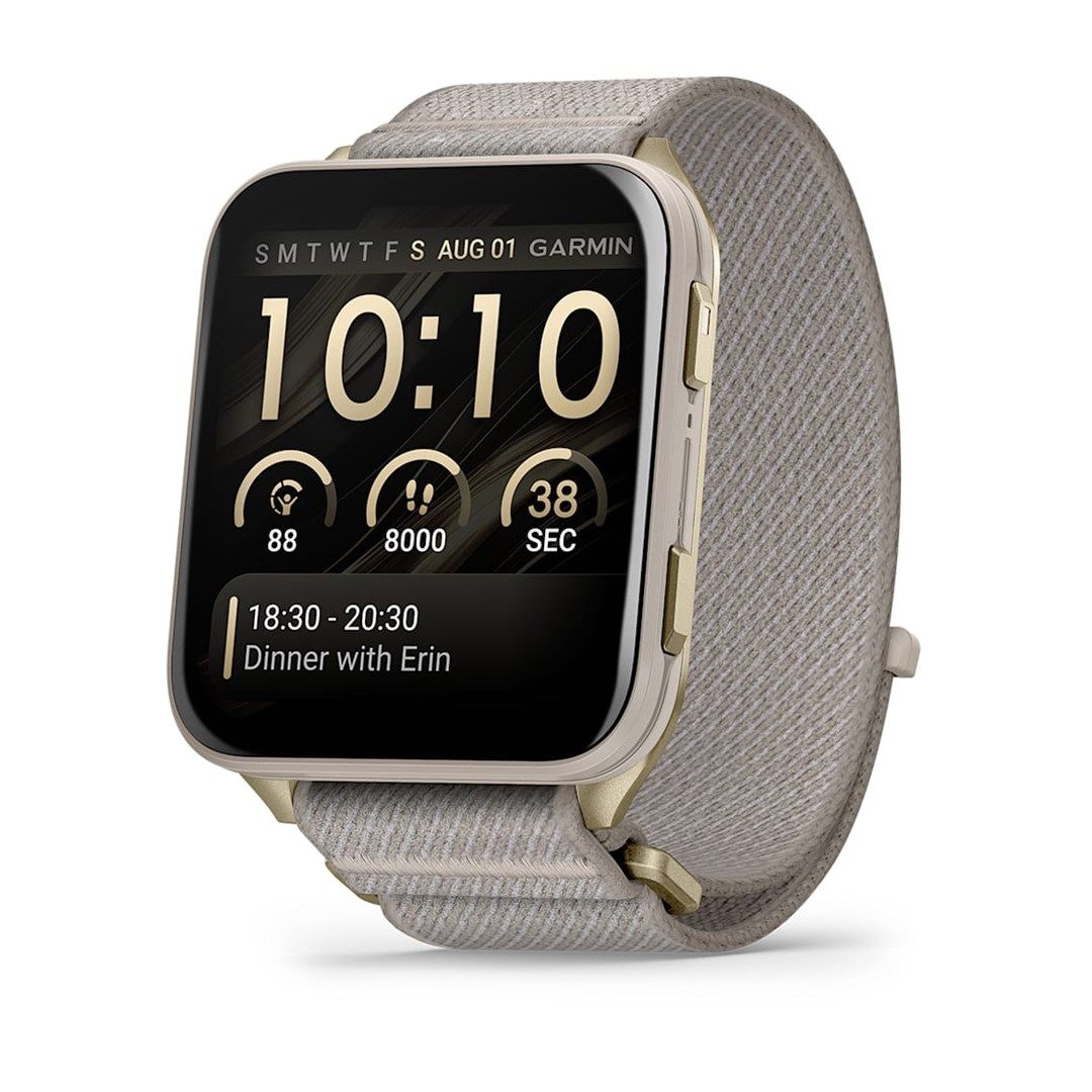 Smartwatch Garmin Venu® X1, Soft Gold cu spate din titan si curea din nailon French Gray